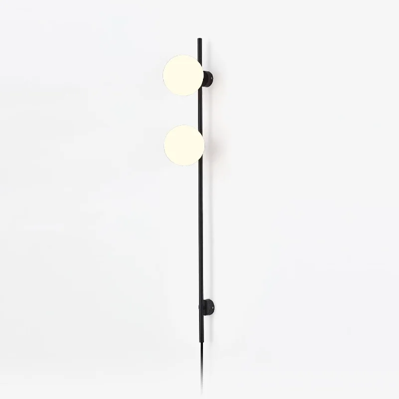 asian - inspired wall lamps with bamboo or paper shades for a zen - like Glass Wall Lamp with a Frosted Shade for Soft Diffused LightHouseof Plug-in Wall Light